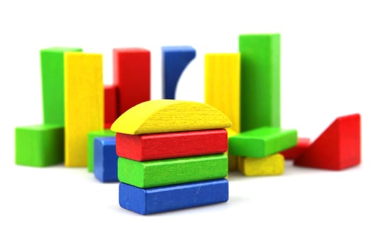 Wooden building blocks isolated on white background