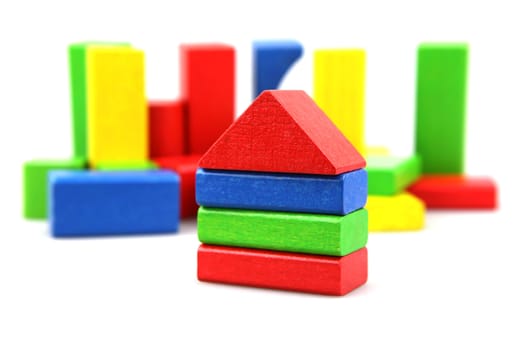 Wooden building blocks isolated on white background
