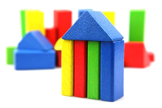 Wooden building blocks isolated on white background