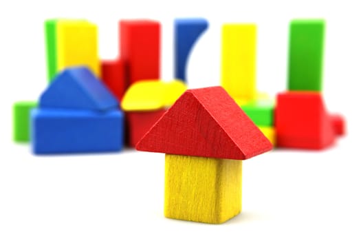 Wooden building blocks isolated on white background