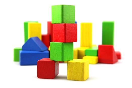 Wooden building blocks isolated on white background