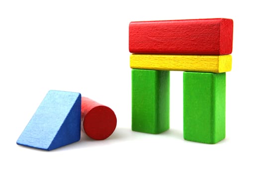 Wooden building blocks isolated on white background