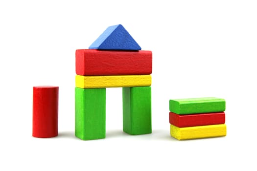 Wooden building blocks isolated on white background