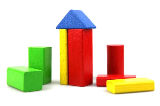 Wooden building blocks isolated on white background