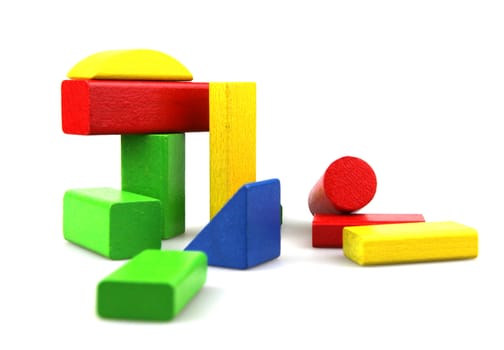 Wooden building blocks isolated on white background
