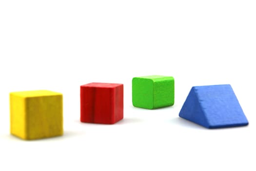 Wooden building blocks isolated on white background