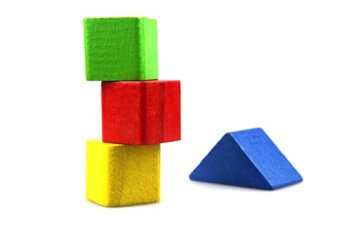Wooden building blocks isolated on white background