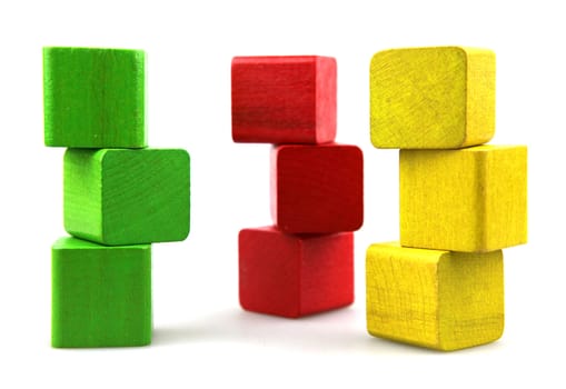 Wooden building blocks isolated on white background