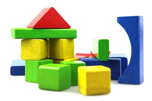 Wooden building blocks isolated on white background