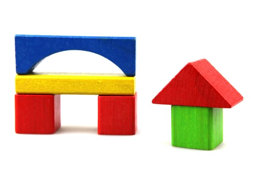 Wooden building blocks isolated on white background