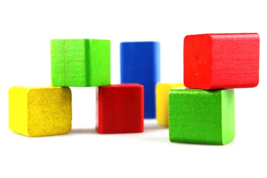 Wooden building blocks isolated on white background