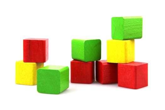 Wooden building blocks isolated on white background