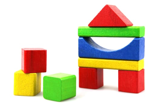 Wooden building blocks isolated on white background