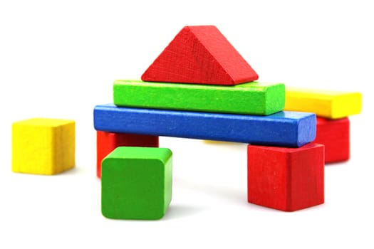 Wooden building blocks isolated on white background