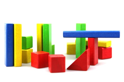 Wooden building blocks isolated on white background