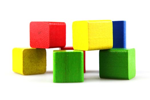Wooden building blocks isolated on white background