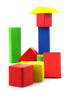 Wooden building blocks isolated on white background