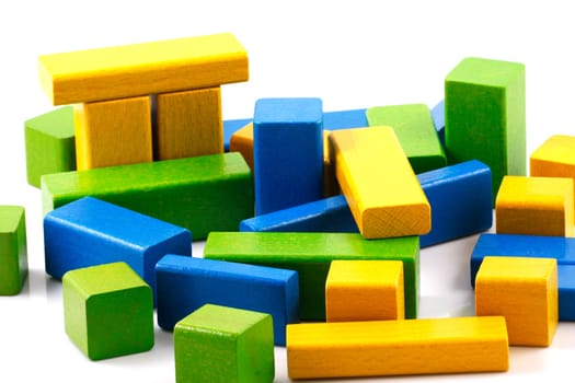 Wooden building blocks isolated on white background