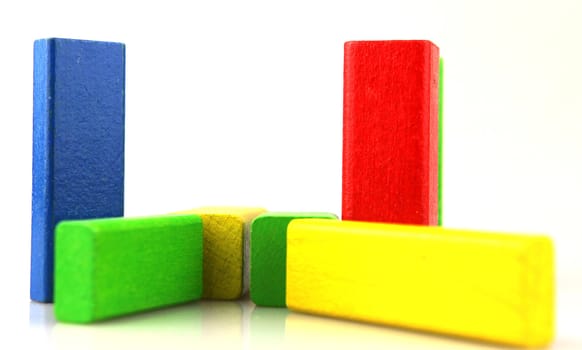 Wooden building blocks isolated on white background