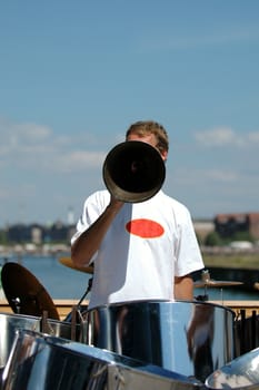 Man is speaking in a megaphone
