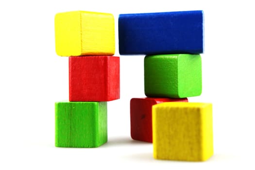 Wooden building blocks isolated on white background