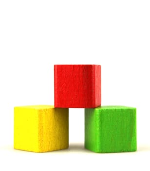 Wooden building blocks isolated on white background