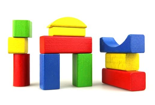 Wooden building blocks isolated on white background
