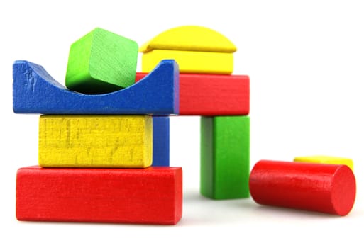 Wooden building blocks isolated on white background