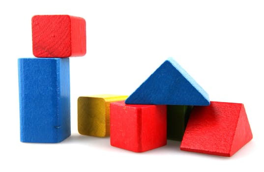 Wooden building blocks isolated on white background