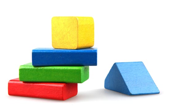 Wooden building blocks isolated on white background