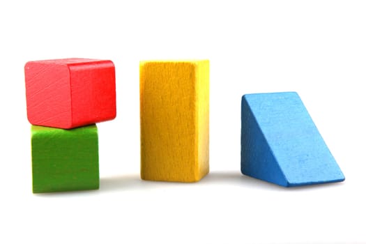 Wooden building blocks isolated on white background