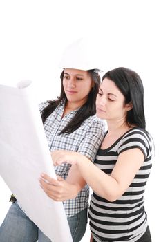 Attractive young engineer with helmet studying planes with her customer
