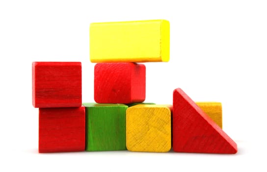 Wooden building blocks isolated on white background