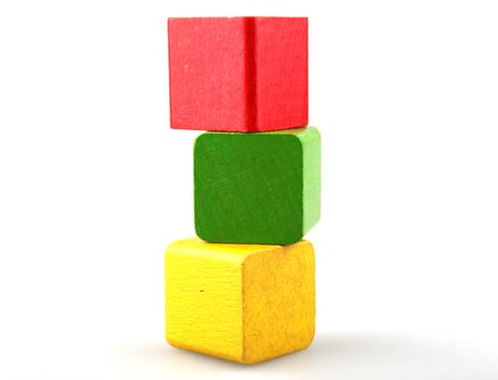 Wooden building blocks isolated on white background