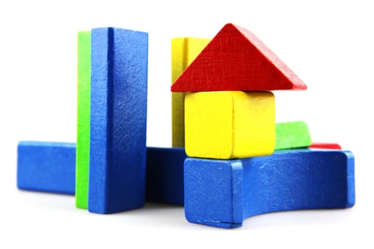 Wooden building blocks isolated on white background