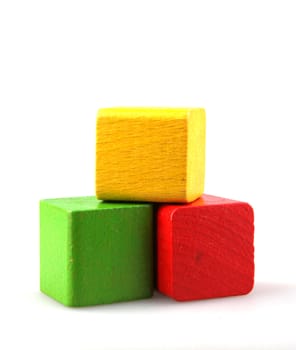 Wooden building blocks isolated on white background