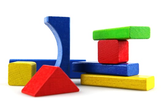 Wooden building blocks isolated on white background