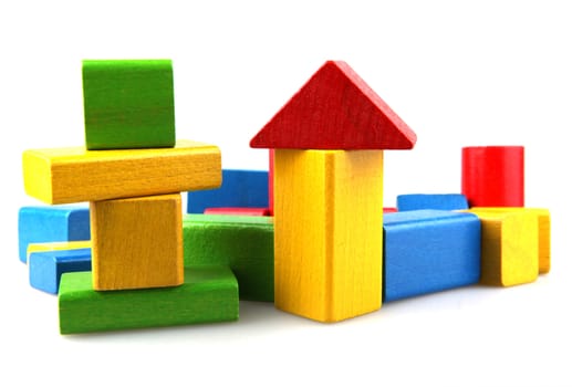 Wooden building blocks isolated on white background