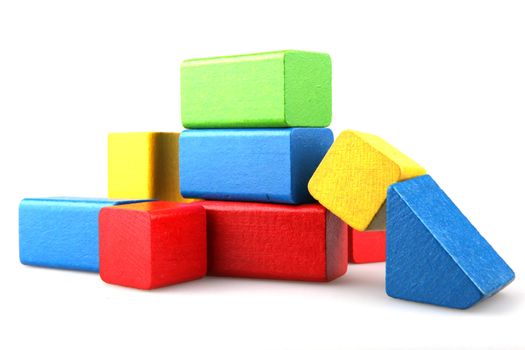 Wooden building blocks isolated on white background