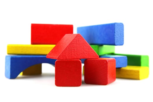 Wooden building blocks isolated on white background