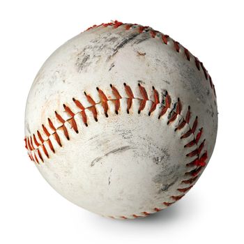 Photo of an old baseball with scratches and worn areas, isolated on white background.
