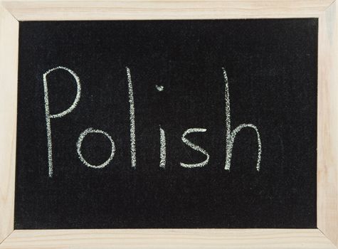 A black board with a wooden frame and the word 'POLISH' written in chalk.