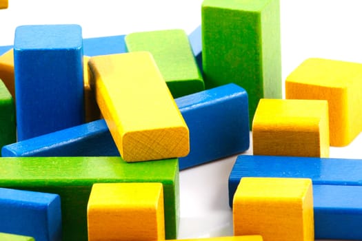 Wooden building blocks isolated on white background