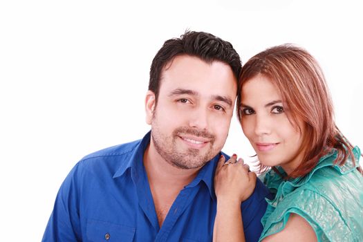 Portrait of a beautiful young happy smiling couple - isolated