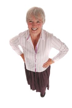 Smiling Senior Businesswoman with Hands on Hips with White Background