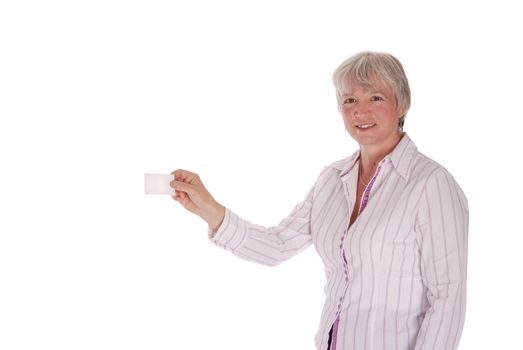 Senior businesswoman holding out a blank business card