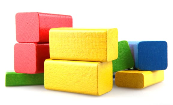 Wooden building blocks isolated on white background