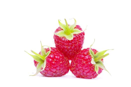 Ripe raspberry isolated on a white background