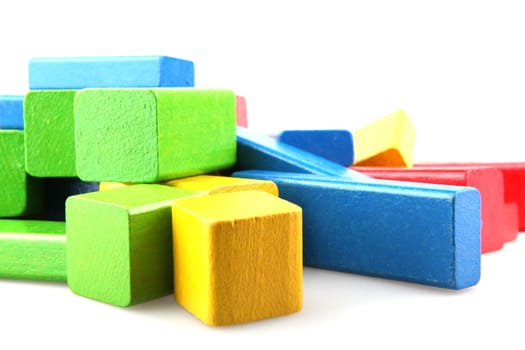 Wooden building blocks isolated on white background