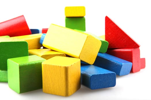 Wooden building blocks isolated on white background